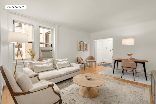 128 Willow St Unit 4F, New York City, NY 11201 - living area featuring cooling unit, light wood-style floors, and crown molding