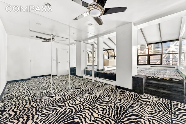 40 Sutton Pl Unit 10M, New York City, NY 10022 - unfurnished bedroom with carpet flooring and ceiling fan