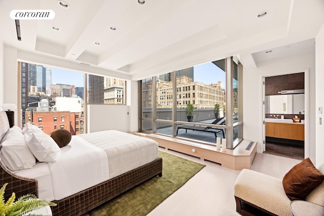 76 Madison Ave Unit Ph1, New York City, NY 10016 - bedroom featuring a city view, recessed lighting, and ensuite bath