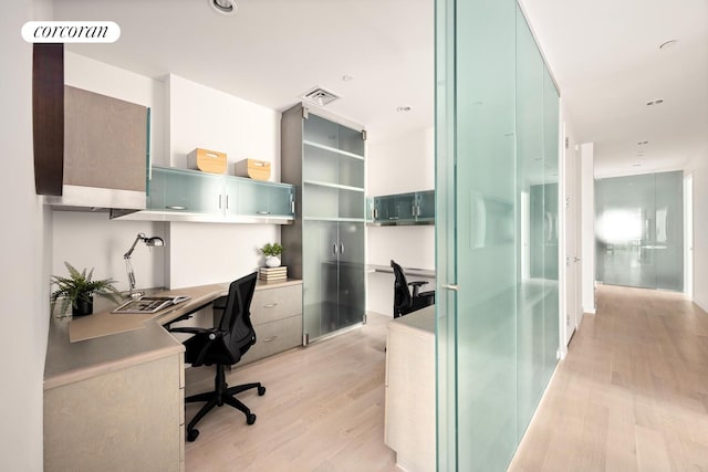 76 Madison Ave Unit Ph1, New York City, NY 10016 - office space with light wood-style floors and built in desk
