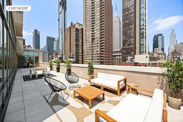 76 Madison Ave Unit Ph1, New York City, NY 10016 - view of patio / terrace featuring a view of skyline and outdoor lounge area