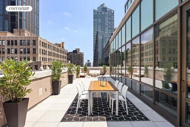 76 Madison Ave Unit Ph1, New York City, NY 10016 - view of patio / terrace with a city view and outdoor dining area