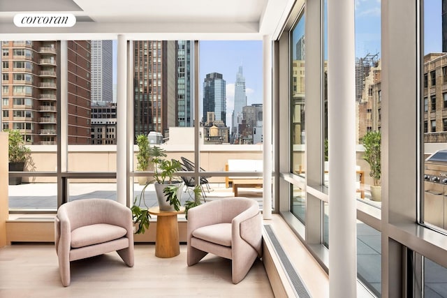 76 Madison Ave Unit Ph1, New York City, NY 10016 - sunroom with a view of skyline and healthy amount of natural light