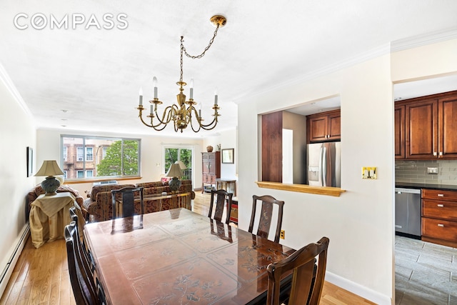 436 78th St Unit 5, New York City, NY 11209 - dining space featuring a baseboard radiator, a chandelier, light wood-style flooring, and crown molding
