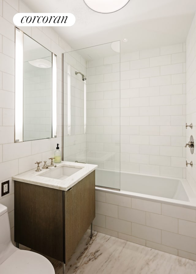 7 Harrison St Unit 4S, New York City, NY 10013 - full bath with tiled shower / bath, vanity, and marble look tiles