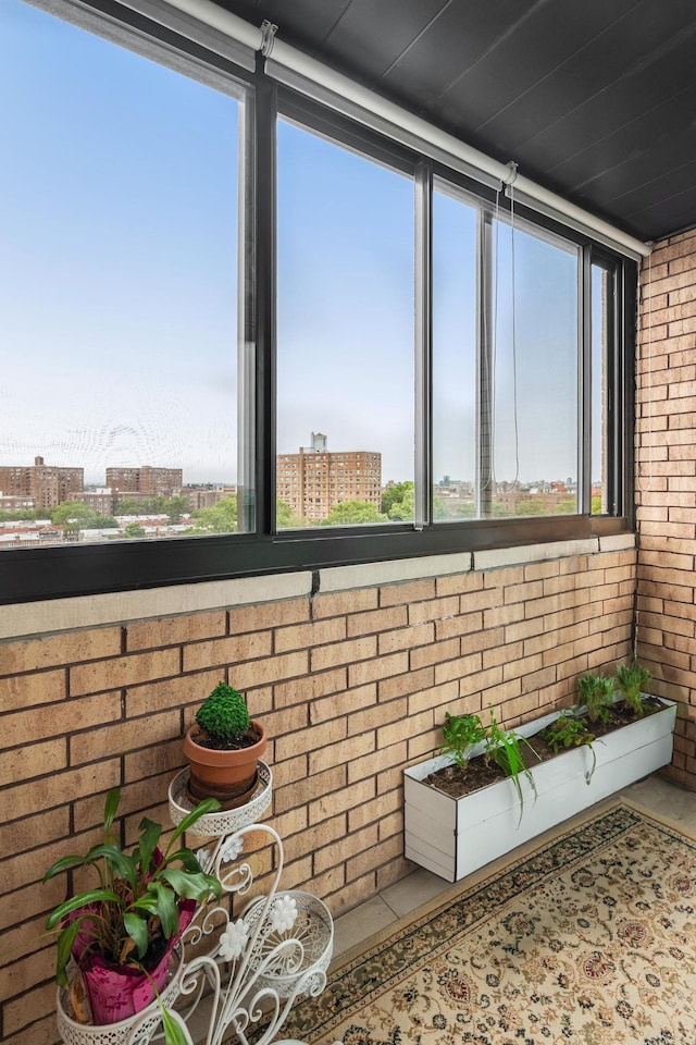 99-31 66th Ave Unit 7-B, New York City, NY 11374 - unfurnished sunroom with a city view