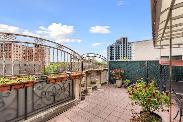 99-31 66th Ave Unit 7-B, New York City, NY 11374 - view of patio / terrace with a city view