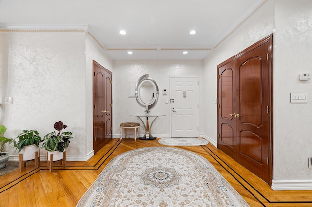 99-31 66th Ave Unit 7-B, New York City, NY 11374 - foyer entrance with light wood-style floors and recessed lighting