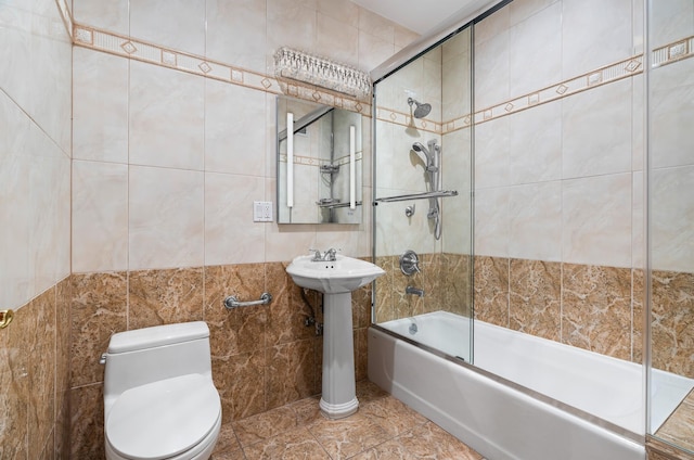 99-31 66th Ave Unit 7-B, New York City, NY 11374 - bathroom with tile walls and shower / bath combination with glass door