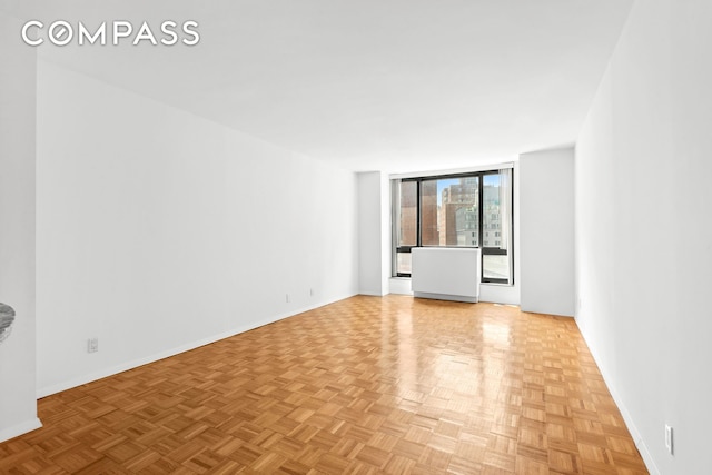 1 Irving Pl Unit U10C, New York City, NY 10003 - spare room with baseboards