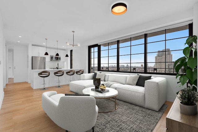 27-21 44th Dr Unit 1601, New York City, NY 11101 - living room with plenty of natural light, light wood-style floors, and recessed lighting
