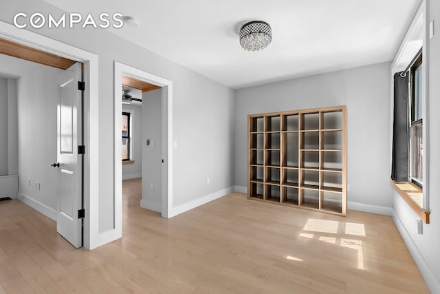 108 Division Ave Unit 22, New York City, NY 11211 - spare room featuring light wood-style flooring and baseboards