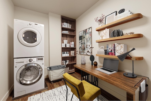257 W 17th St Unit 2B, New York City, NY 10011 - laundry area with stacked washer / dryer, wood finished floors, and a desk