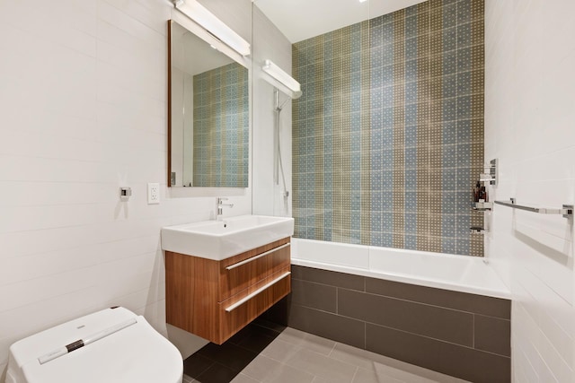257 W 17th St Unit 2B, New York City, NY 10011 - full bath featuring vanity, tile patterned floors, and tiled shower / bath combo