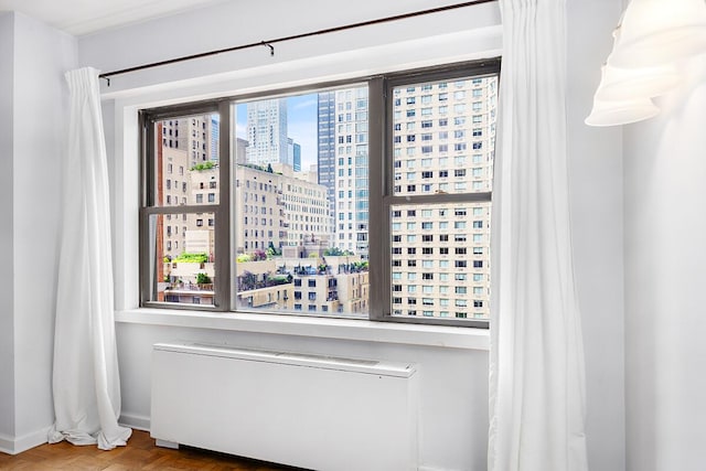 20 W 64th St Unit 11U, New York City, NY 10023 - unfurnished room with a view of city and radiator heating unit