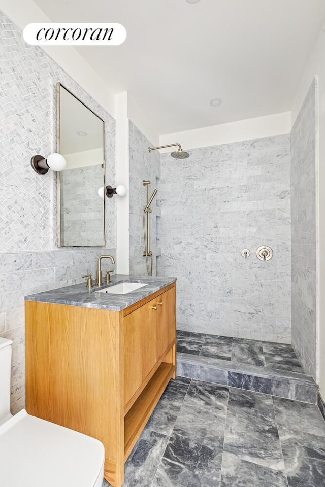 722 President St Unit 2, New York City, NY 11215 - full bathroom with a walk in shower, vanity, tile walls, and marble finish flooring