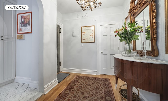 333 E 80th St Unit 3G, New York City, NY 10075 - entrance foyer with a chandelier and arched walkways