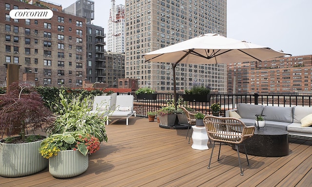 333 E 80th St Unit 3G, New York City, NY 10075 - wooden terrace with outdoor lounge area and a view of city