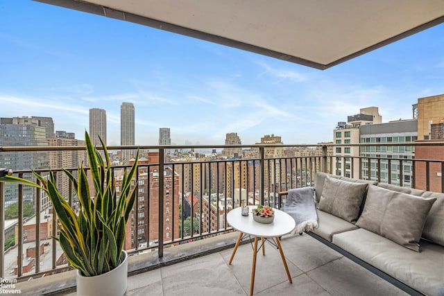 201 W 70th St Unit 24B, New York City, NY 10023 - balcony featuring an outdoor hangout area and a city view