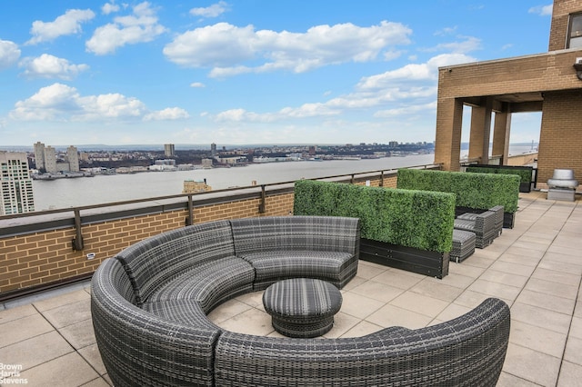 201 W 70th St Unit 24B, New York City, NY 10023 - view of patio with a water view and a city view