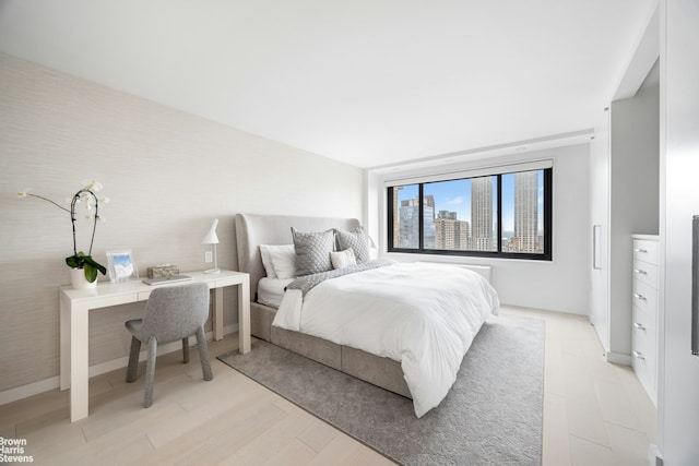 201 W 70th St Unit 24B, New York City, NY 10023 - bedroom with light wood-style floors
