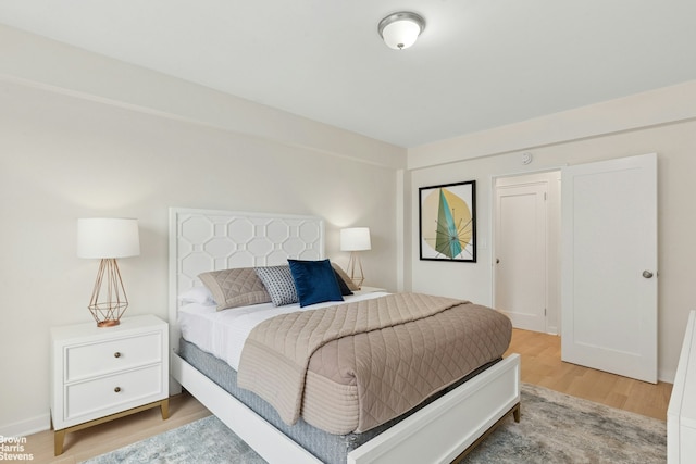 130 8th Ave Unit 6E, New York City, NY 11215 - bedroom featuring light wood finished floors