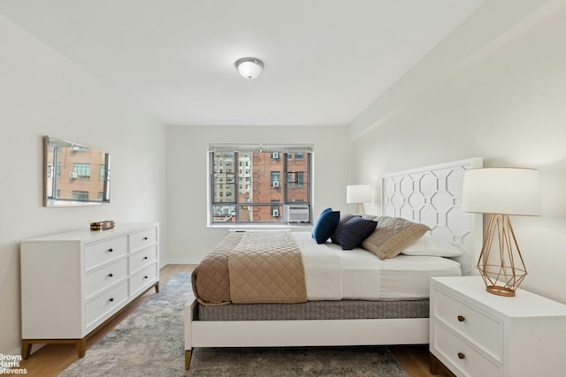 130 8th Ave Unit 6E, New York City, NY 11215 - bedroom featuring dark wood-type flooring