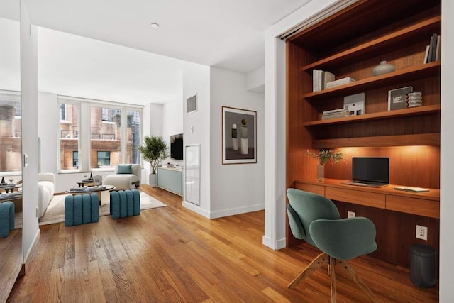 15 William St Unit 9C, New York City, NY 10004 - office featuring baseboards and wood finished floors