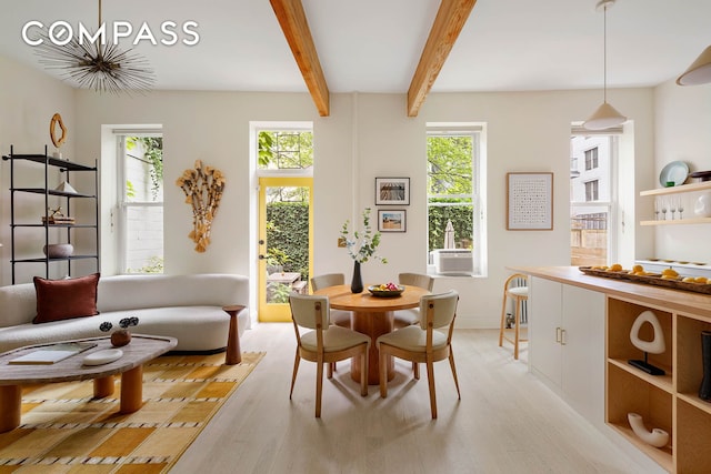 252 Greene Ave Unit 1B, New York City, NY 11238 - dining space featuring light wood finished floors, plenty of natural light, beam ceiling, and cooling unit