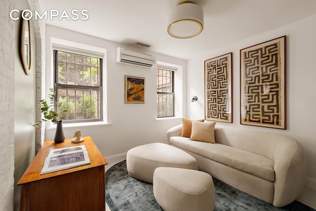 252 Greene Ave Unit 1B, New York City, NY 11238 - living area with a wall unit AC and baseboards