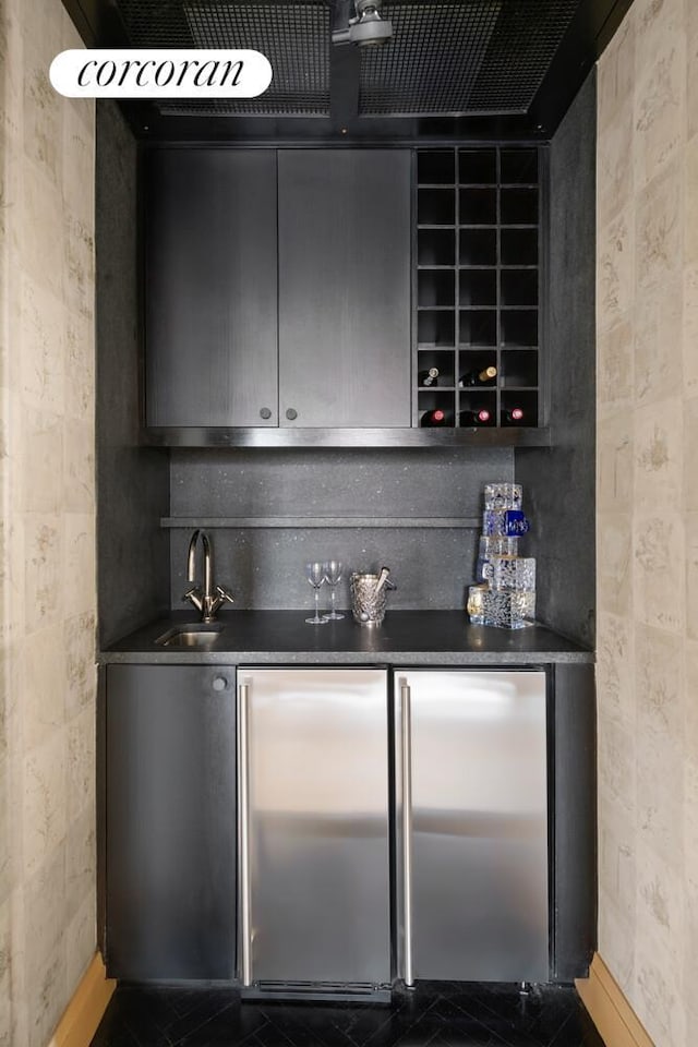 28 E 70th St Unit Ph1, New York City, NY 10021 - indoor wet bar featuring stainless steel built in fridge and high end refrigerator