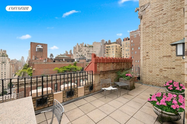 28 E 70th St Unit Ph1, New York City, NY 10021 - view of patio with exterior kitchen and a view of city