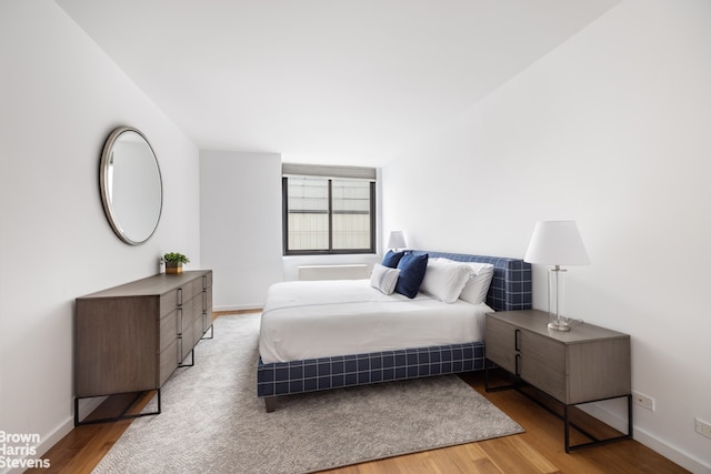 515 E 72nd St Unit 5F, New York City, NY 10021 - bedroom with wood finished floors and baseboards