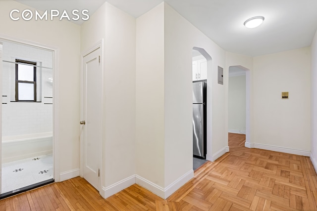 41-09 41st St Unit 2B, New York City, NY 11104 - hallway with arched walkways and electric panel