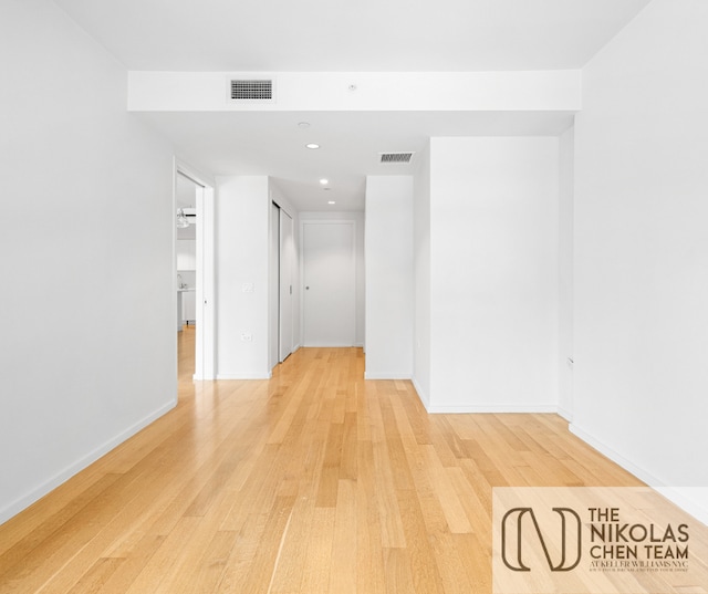 425 W 53rd St Unit 205, New York City, NY 10019 - empty room with light wood-style flooring and recessed lighting