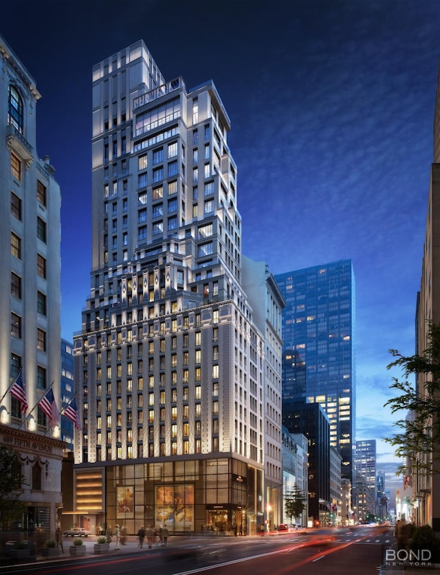 685 5th Ave Unit 9A, New York City, NY 10022 - view of building exterior with a view of city lights