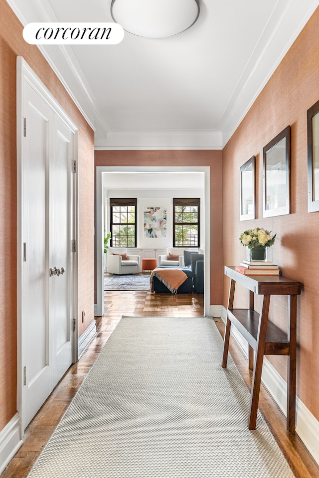 174 W 76th St Unit 3H, New York City, NY 10023 - corridor with crown molding and light wood finished floors