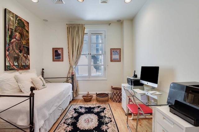 684 Broadway Unit 4E, New York City, NY 10012 - bedroom featuring light wood-style flooring, recessed lighting, and a desk