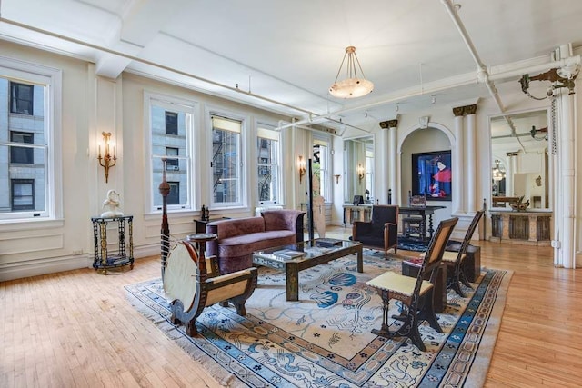684 Broadway Unit 4E, New York City, NY 10012 - living area featuring light wood-style flooring and coffered ceiling