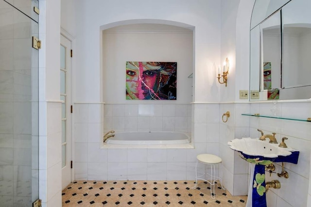 684 Broadway Unit 4E, New York City, NY 10012 - bathroom with a garden tub