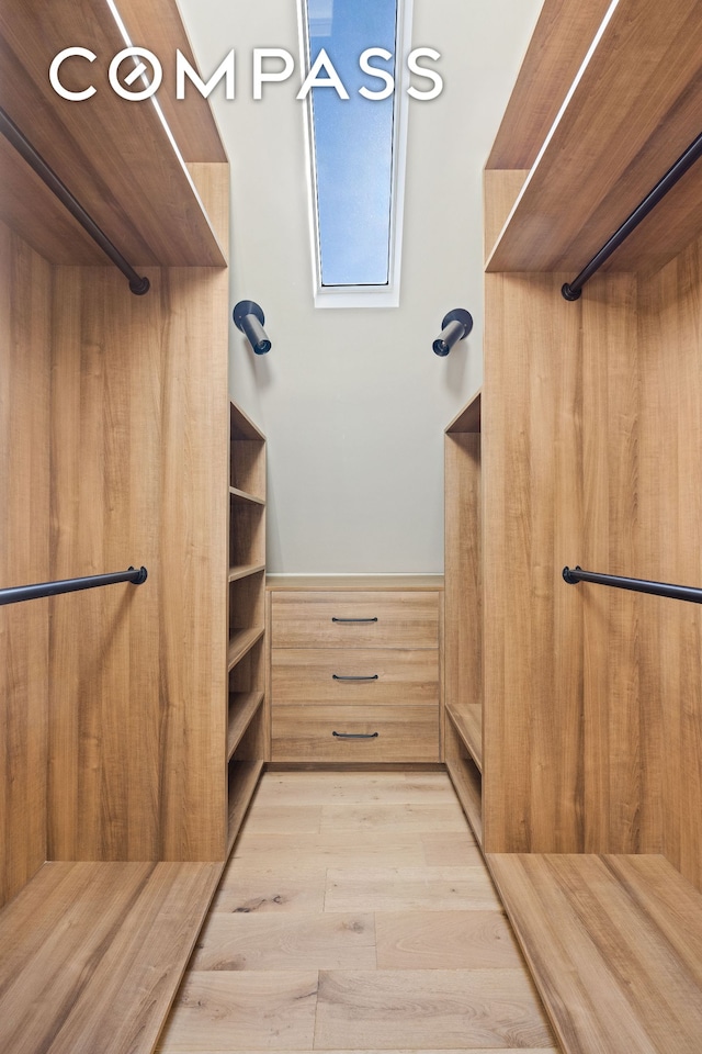 320 E 18th St Unit 5, New York City, NY 11226 - spacious closet with light wood-style floors