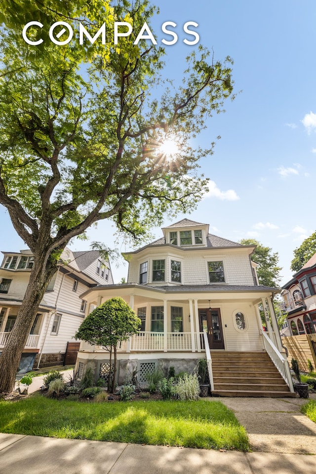 320 E 18th St Unit 5, New York City, NY 11226 - traditional style home featuring a porch