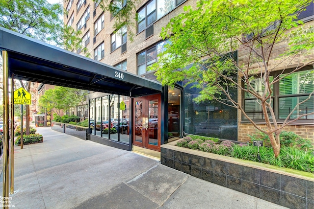 340 E 74th St Unit 9G, New York City, NY 10021 - view of exterior entry with french doors