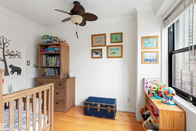 340 E 74th St Unit 9G, New York City, NY 10021 - bedroom featuring wood finished floors and crown molding