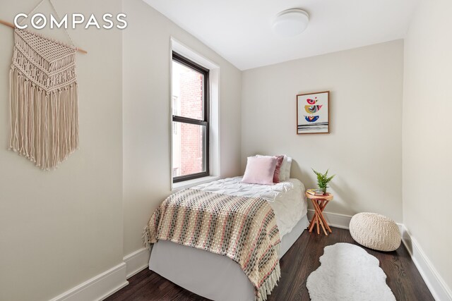 160 Ocean Pkwy Unit 6C, New York City, NY 11218 - bedroom featuring baseboards and dark wood finished floors