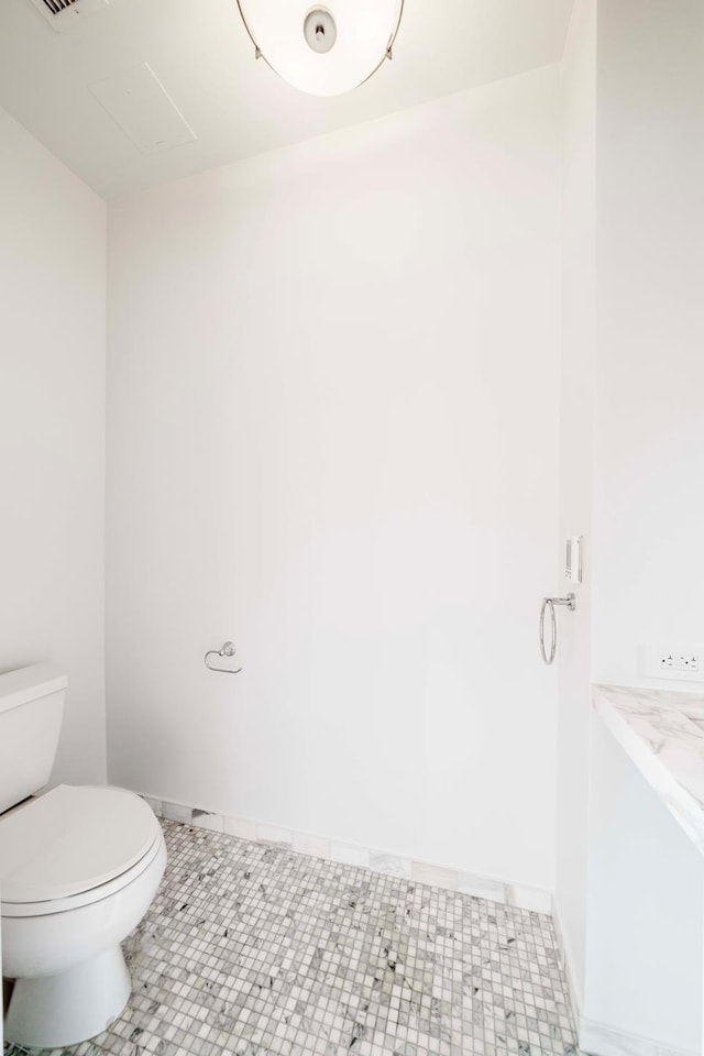 1182 Broadway Unit 10D, New York City, NY 10001 - bathroom featuring toilet and baseboards
