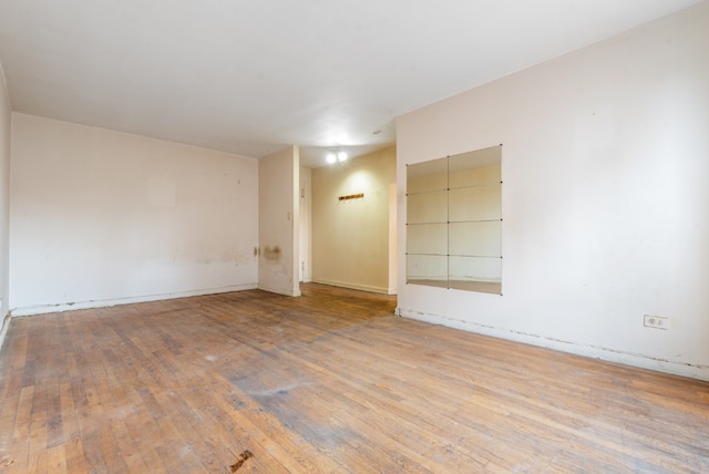 67-30 Clyde St Unit 5R, New York City, NY 11375 - spare room featuring hardwood / wood-style floors and baseboards