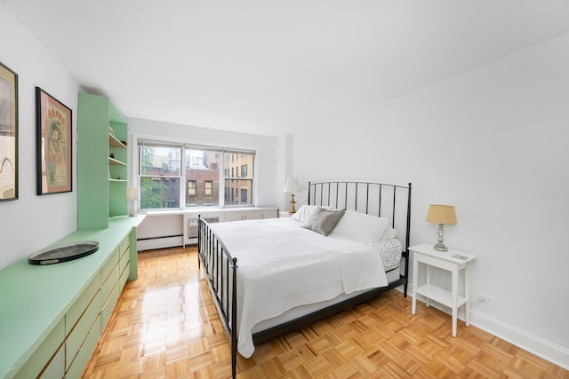 308 W 103rd St Unit 5C, New York City, NY 10025 - bedroom featuring baseboard heating and baseboards