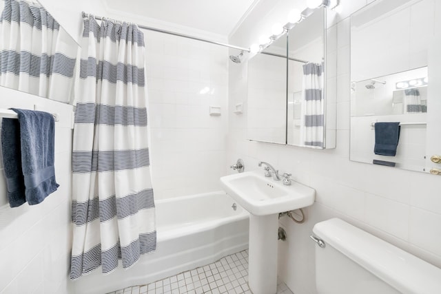 308 W 103rd St Unit 5C, New York City, NY 10025 - full bathroom featuring shower / bath combination with curtain, tile walls, and tile patterned floors
