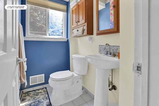 2054 Richmond Ave, New York City, NY 10314 - bathroom featuring toilet and tile patterned floors